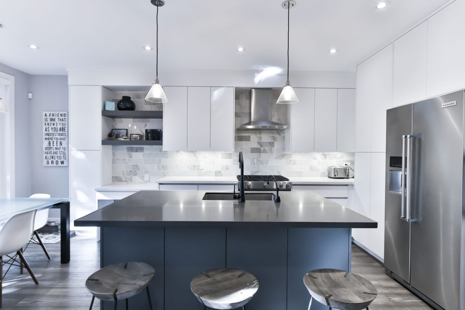 black countertops white cabinet modern kitchen